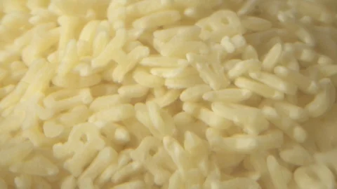 Green fresh broccoli in a closeup view as clean liquid water sprays over the Stock Footage 102585227