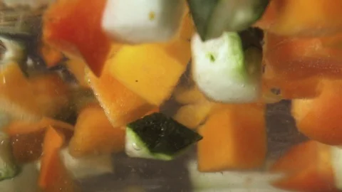 Green fresh broccoli in a closeup view as clean liquid water sprays over the Stock Footage 102585436
