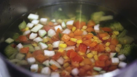 Green fresh broccoli in a closeup view as clean liquid water sprays over the Stock Footage 102586454
