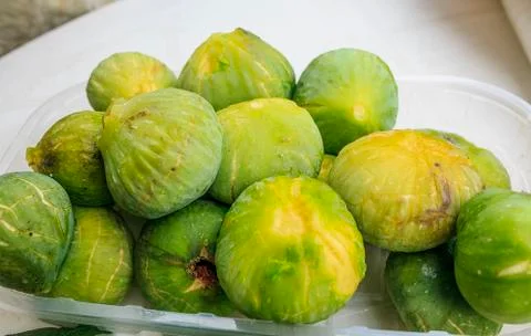 Green fresh figs on a table Stock Photos