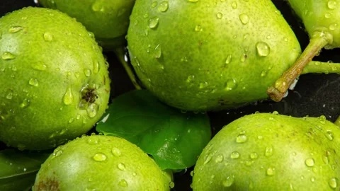 Green  fresh pears with droplets Stock Footage 132745900