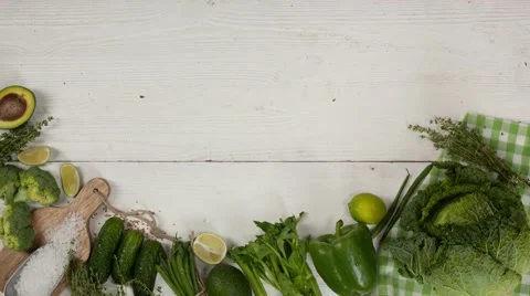 Green Fresh Vegetables board top view copyspace stop motion and time-lapse 4k Stock Footage 67861388