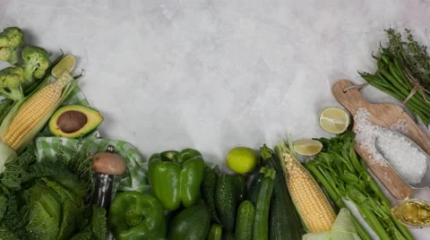 Green Fresh Vegetables table top view copyspace stop motion and time-lapse 4k Stock Footage 67861396