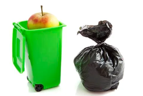 Green garbage bag Stock Photos