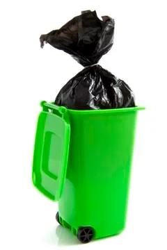 Green garbage bag Stock Photos