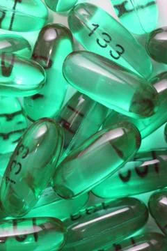 Green gel caplets Stock Photos