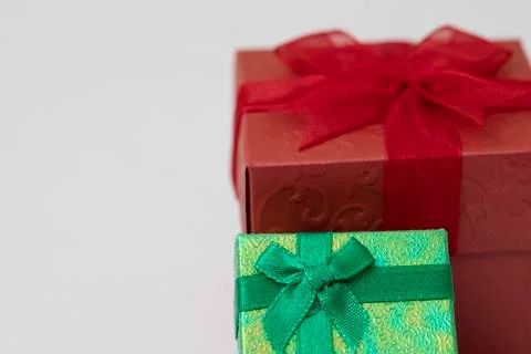 Green gift box and Red Gift Box with Ribbon and Bow on the White Background Stock Photos