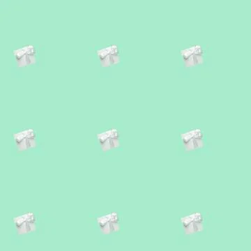 Green gift boxes on green background. Seamless pattern, holiday concept . Stock Photos