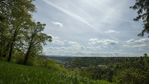 Green glade and running clouds, timelapse Stock Footage 88871990