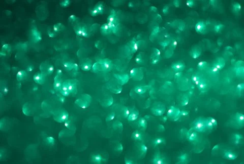 Green glitter bokeh Stock Photos