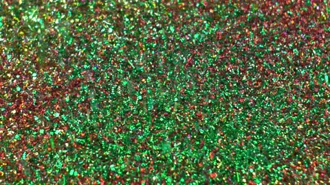 Green Glitter Particles Falling Down Slow Motion Video stock 147607423