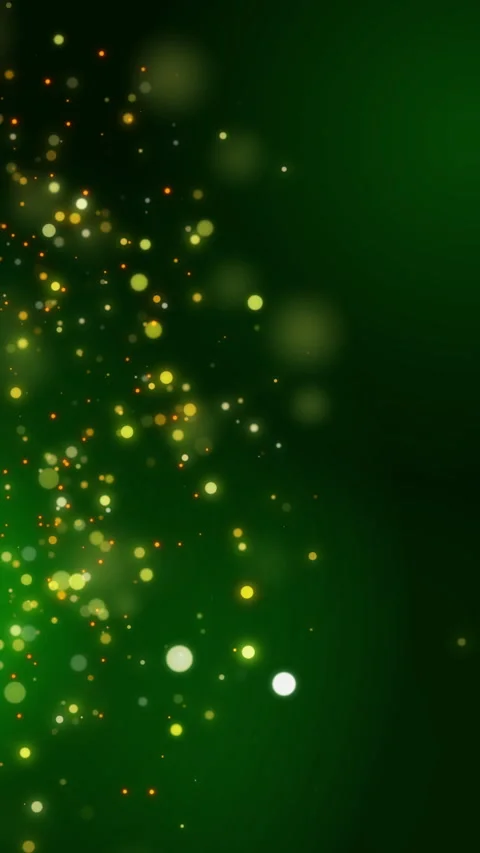 Green glitter particles, shine confetti and glowing lights effect. Grid looped Video stock 293601909