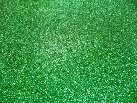 Green glitter with selective focus. Stock Photos