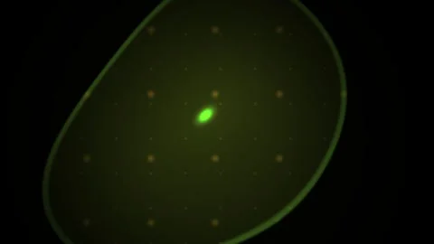 Green glowing object on black background. Stock Footage 336701736