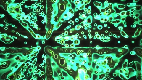 Green Glowing Particles Forming Vibrant Symmetrical Neon Bubble Pattern on .. Stock Footage 343716319