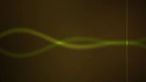 Green Glowing Sine Wave Animation on Dark Oscilloscope Screen Stock Footage 343716381