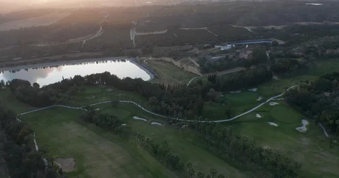 Green golf course, aerial view putting green. Video stock 128038298