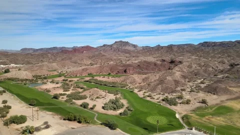 Green Golf Course In A Brown Desert Stock-Footage 209295974