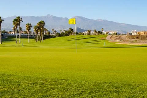 Green golf course facing the mountain and Teide Stock Photos