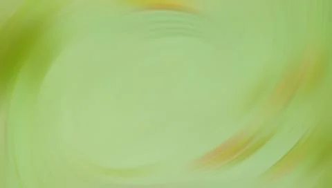 Green gradient swirling abstract background with yellow accents Иллюстрация