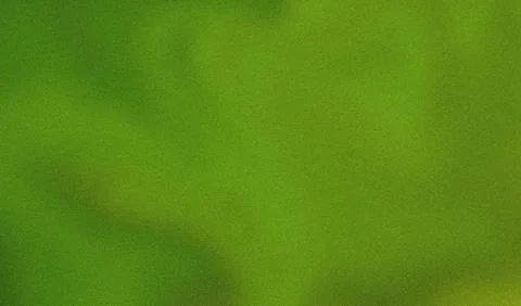 Green grainy textured background with subtle light effects Foto stock