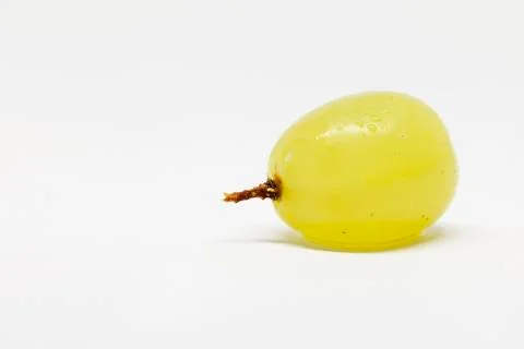 A green grape on a white background Stock Photos