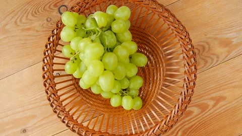 Green grapes in a basket. Stock Footage 239712362