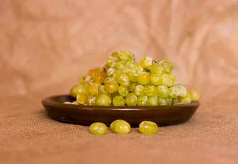 Green grapes on a clay brown dish Stock Photos