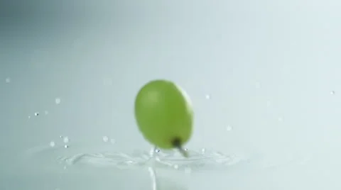 Green grapes falling and bouncing. Slow Motion. Stock Footage 55877314