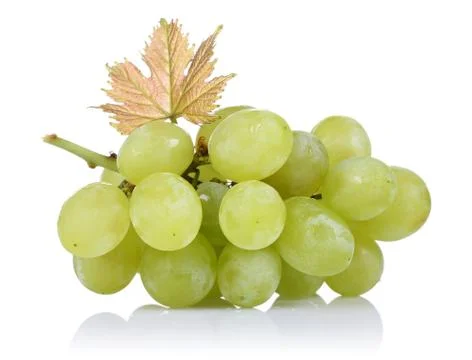 Green grapes with leaf on white background Stock Photos