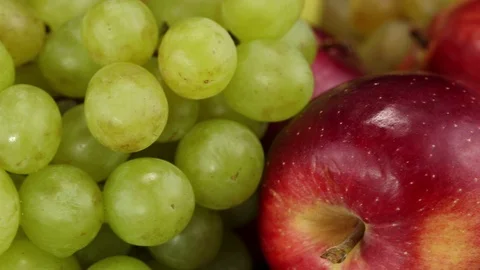 Green grapes, red apples, light grapes Stock Footage 124300646