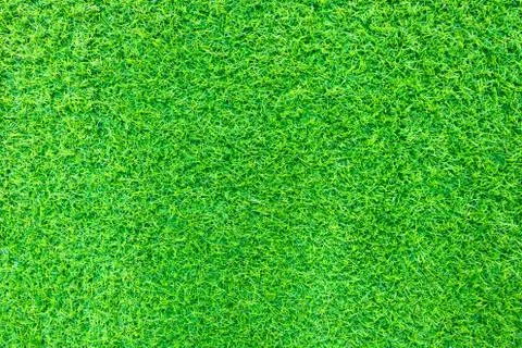 Green grass artificial background texture. with copyspace. Stock Photos