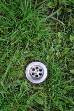 Green grass drain Stock-Fotos