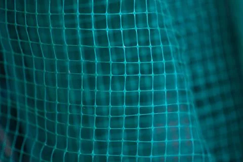 Green grid background. geometrically distorted texture grid. Stock Photos