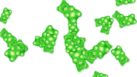 Green Gummy Bear Candies Falling and Bouncing on White Background Stock Footage 344622859