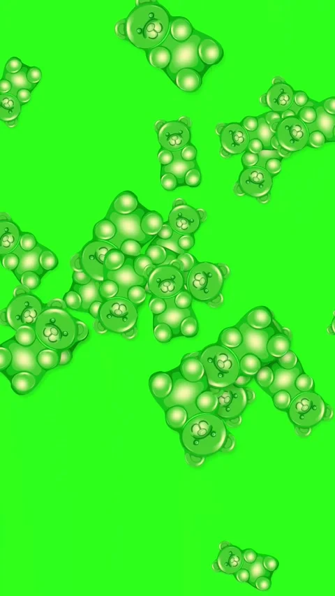 Green Gummy Bear Candy Falling on Bright Green Background Stock Footage 345118000