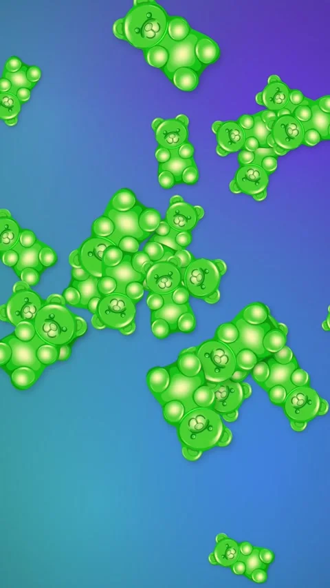 Green Gummy Bears Falling Over Blue and Purple Gradient Background Stock Footage 345703591