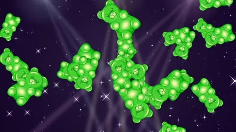 Green Gummy Bears Floating Over Sparkling Glitter Background Stock Footage 345704779