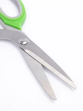 Green handle craft scissors closed Stock Photos