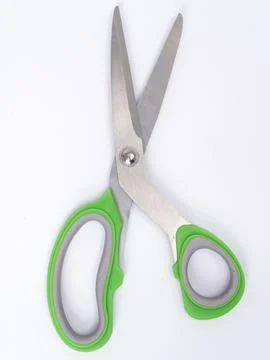 Green handle craft scissors open Foto stock