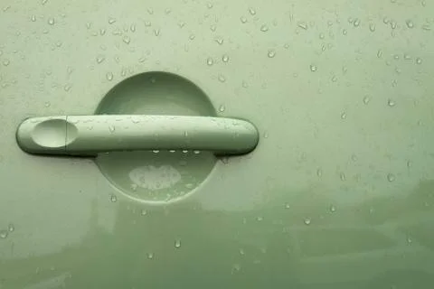 Green handle on the door of the car Foto stock