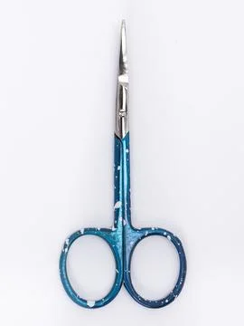 Green handle scissors closed blades Stock Photos