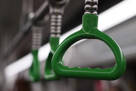 Green handle in the train Stock Photos