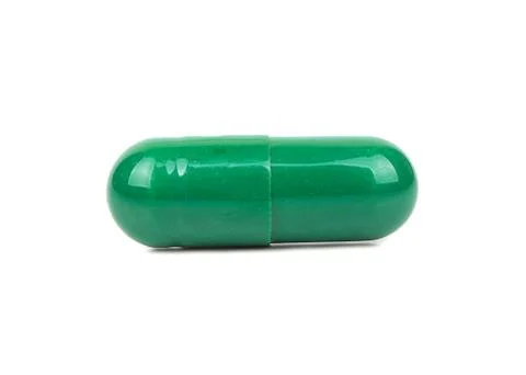 Green herbal capsule Foto stock