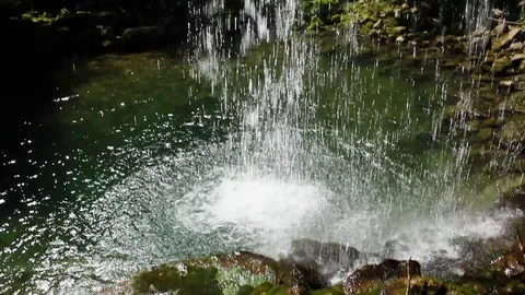 Green hidden magic waterfall in the middle of forest Stock Footage 112026998