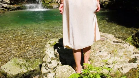 Green hidden magic waterfall in the middle of forest Stock Footage 112027113