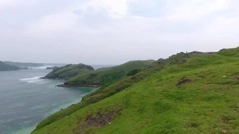 Green Hill And Beach of Merese Hill, Lombok Island, Indonesia Stock Footage 131449558