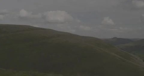 Green hill and clouds, 4k VLOG, 24fps Stock Footage 277229075