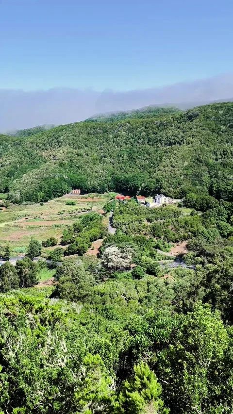 Green hills and patchwork farmland below Mirador de Jardina in Anaga Mountain Stock Footage 328270215