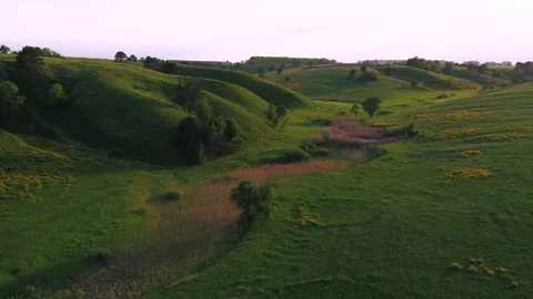 Green hills at sunset Video stock 255181774